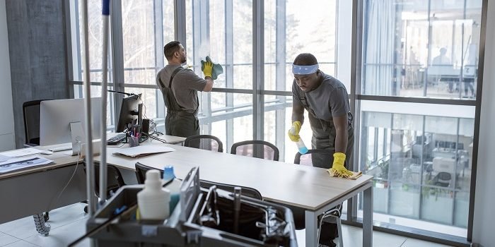 full-shot-men-cleaning-office