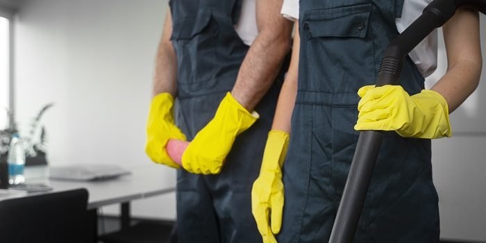 side-view-people-cleaning-building